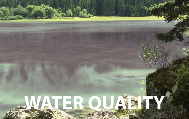 Photo of lake depicting chromophoric dissolved organic matter with superimposed text 'water quality'.